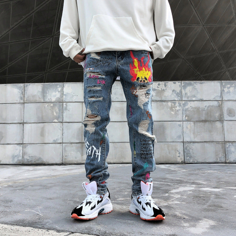 Graffiti ripped jeans