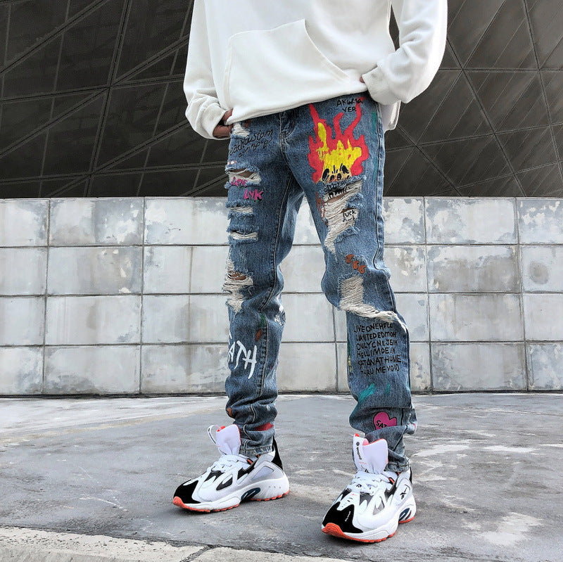 Graffiti ripped jeans